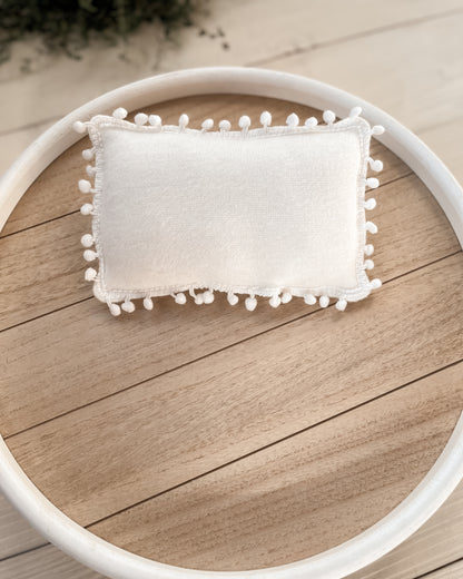 Polštářek s bambulkami