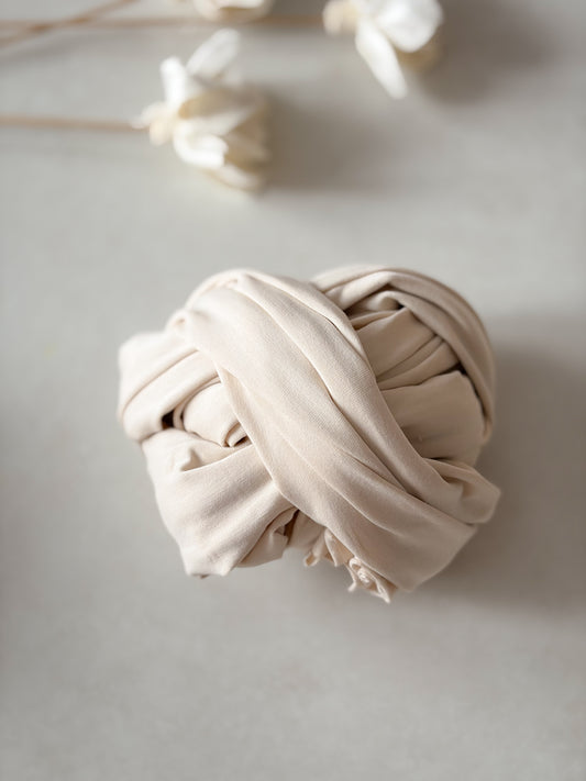 Úpletový wrap z kolekce Creamy Knots