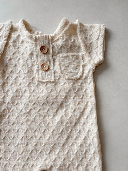 Overal Theo z kolekce Creamy Knots